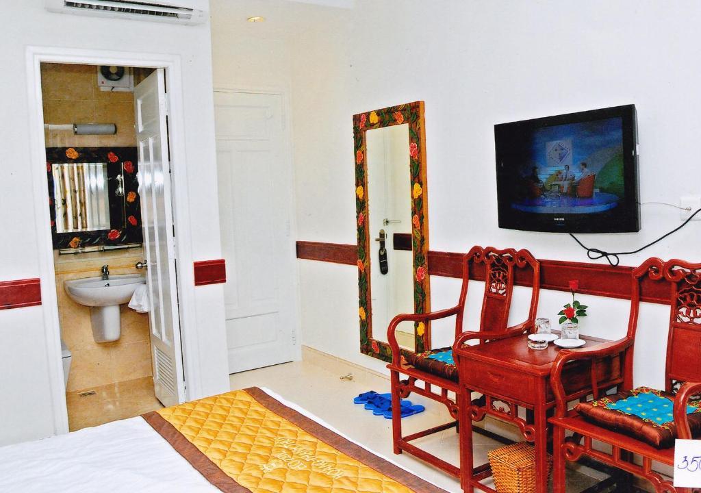 Hoang Thanh Thuy Airport Hotel 1 - Gan Am Thuc Dem Cho Hoang Hoa Tham Хошимін Номер фото